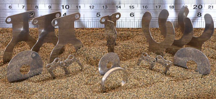 mass surface finishing extremely small and thin parts.